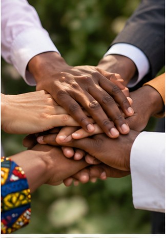 Many hands coming together in unity